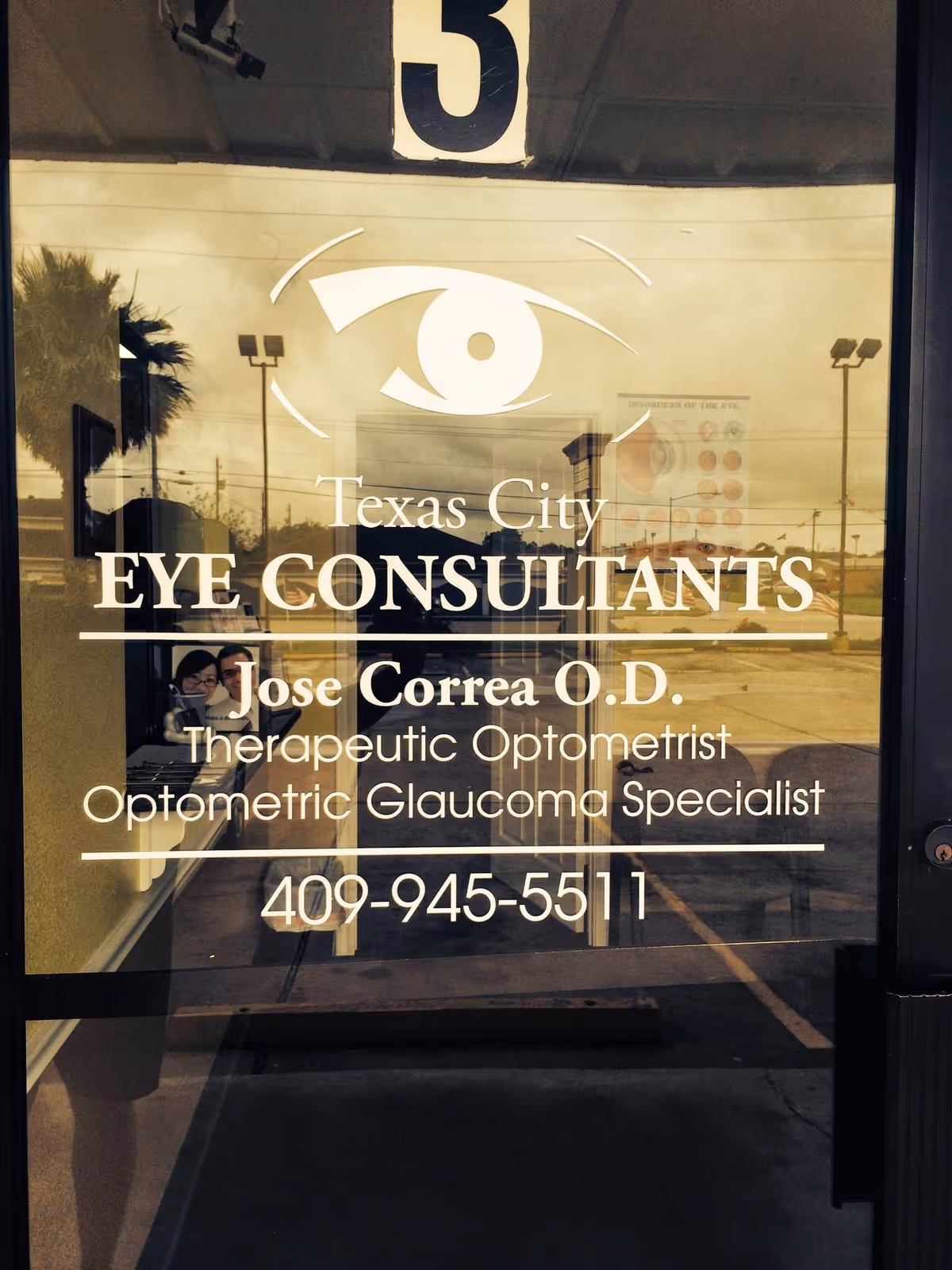 Glass storefront door displays Texas City Eye Consultants logo and contact information.