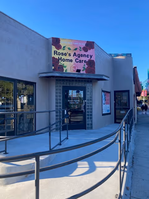 Exterior of Rose's Agency Home Care storefront with ramp on sidewalk