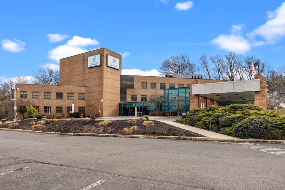 Exterior view of Bunny Home Care Greater Philadelphia, PA building with glass entrance.