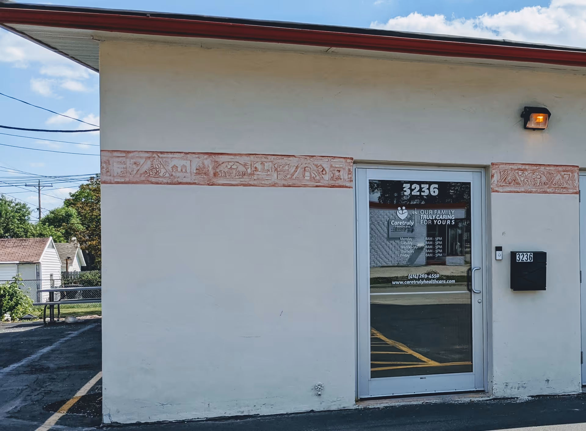 Exterior of CareTruly Healthcare building with glass door and 3236 address