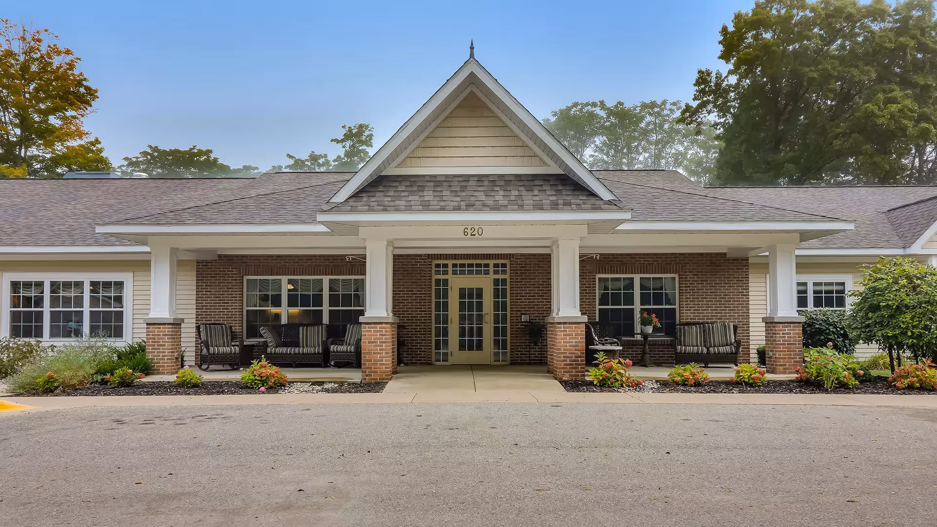 Front view of Briarwood Assisted Living & Memory Care building with a covered porch.