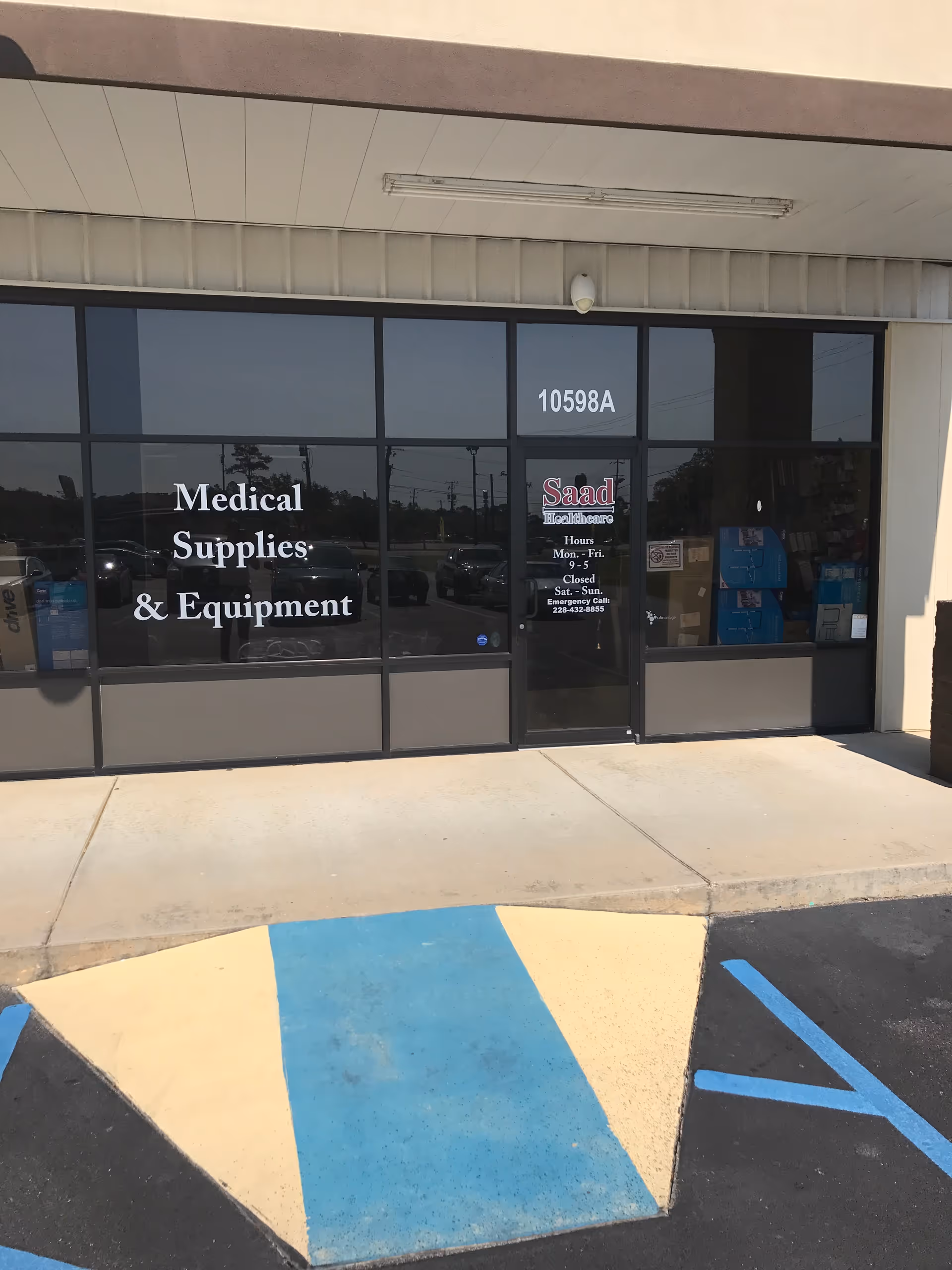 Front of Saad Healthcare storefront displaying Medical Supplies & Equipment signage and parking.