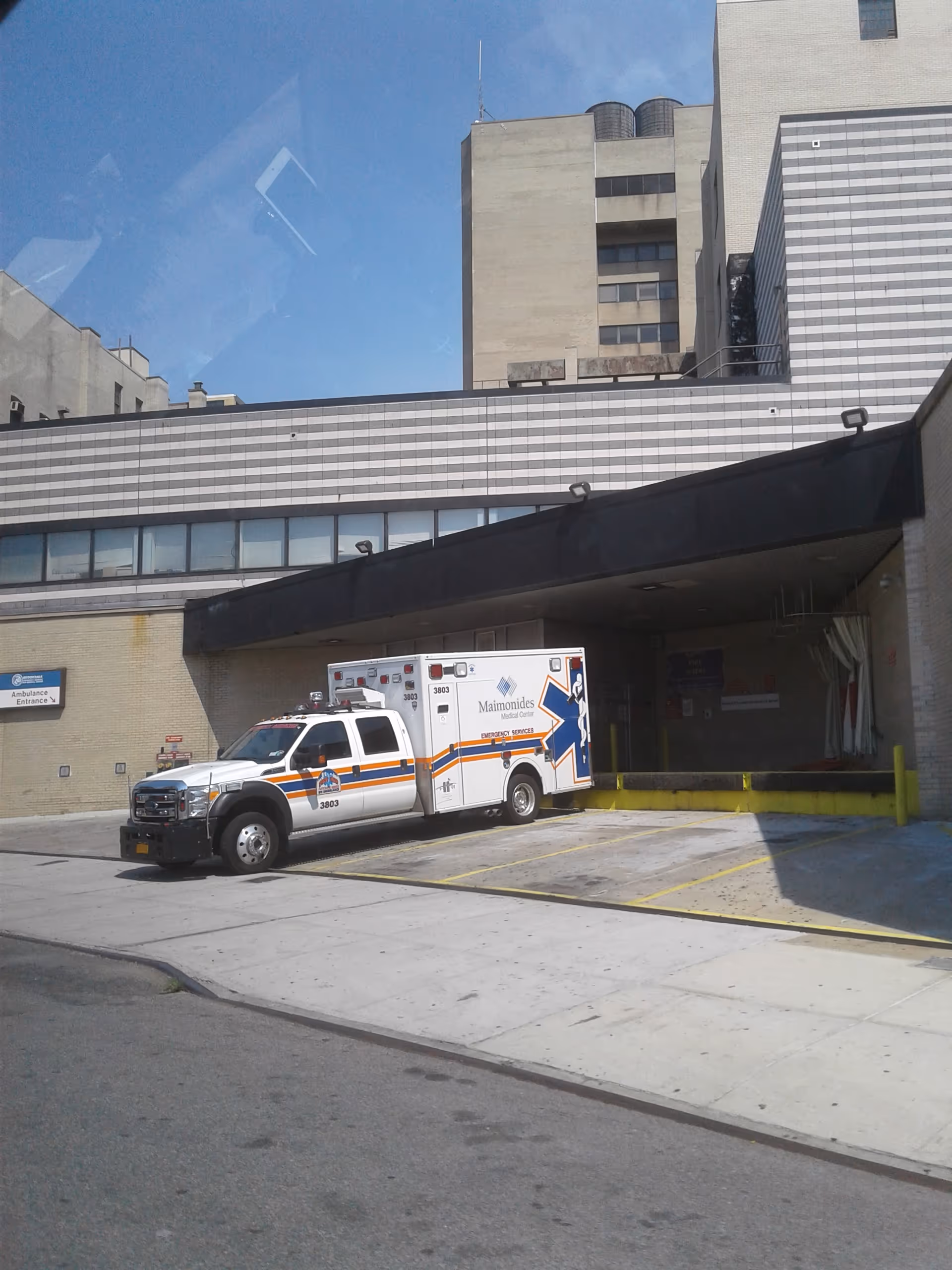 An ambulance parked at the hospital entrance of Brooklyn's Brookdale University Medical Center.
