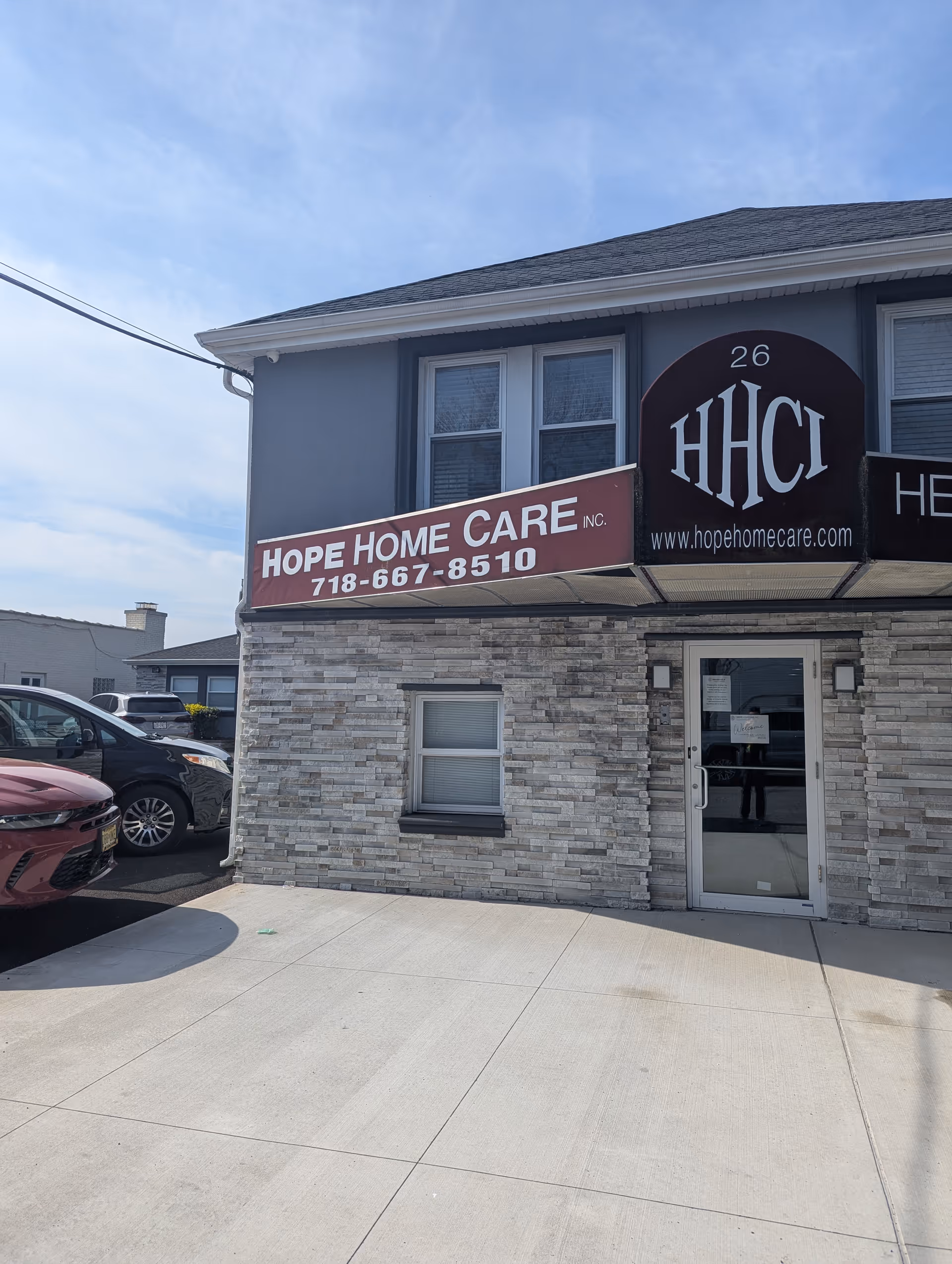 Exterior view of Hope Home Care building with sign and front entrance.