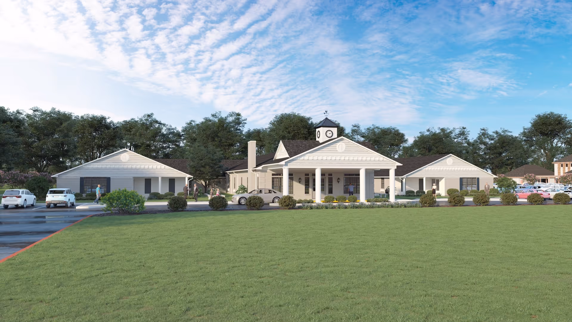 Exterior view of Lamar Place senior living facility with a portico, clock tower, and parked cars.