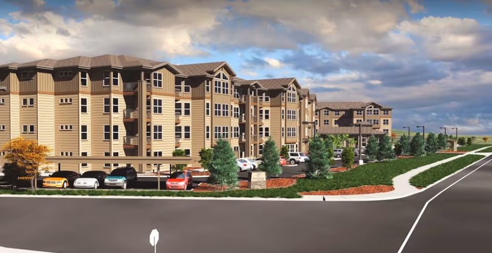 Exterior view of Bonaventure of Salmon Creek building with cars and landscaping.