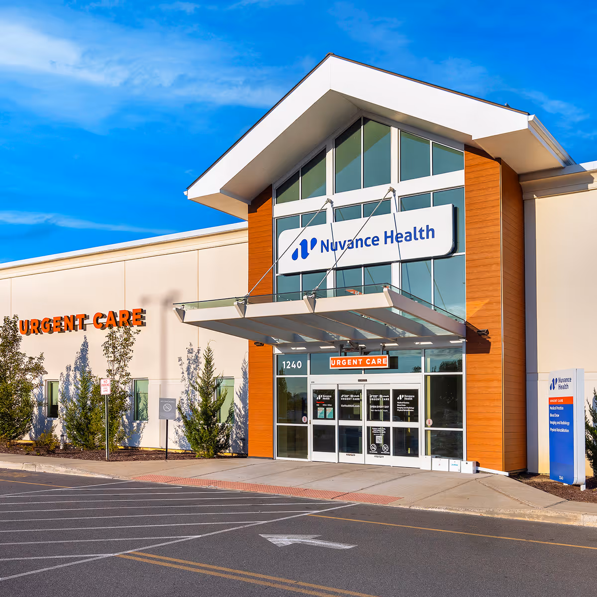 Facade of a medical facility with Nuvance Health sign and urgent care entrance.