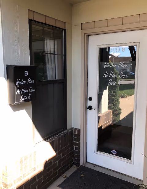Exterior entrance to Windsor Place At-Home Care, door and mailbox labeled Suite B.