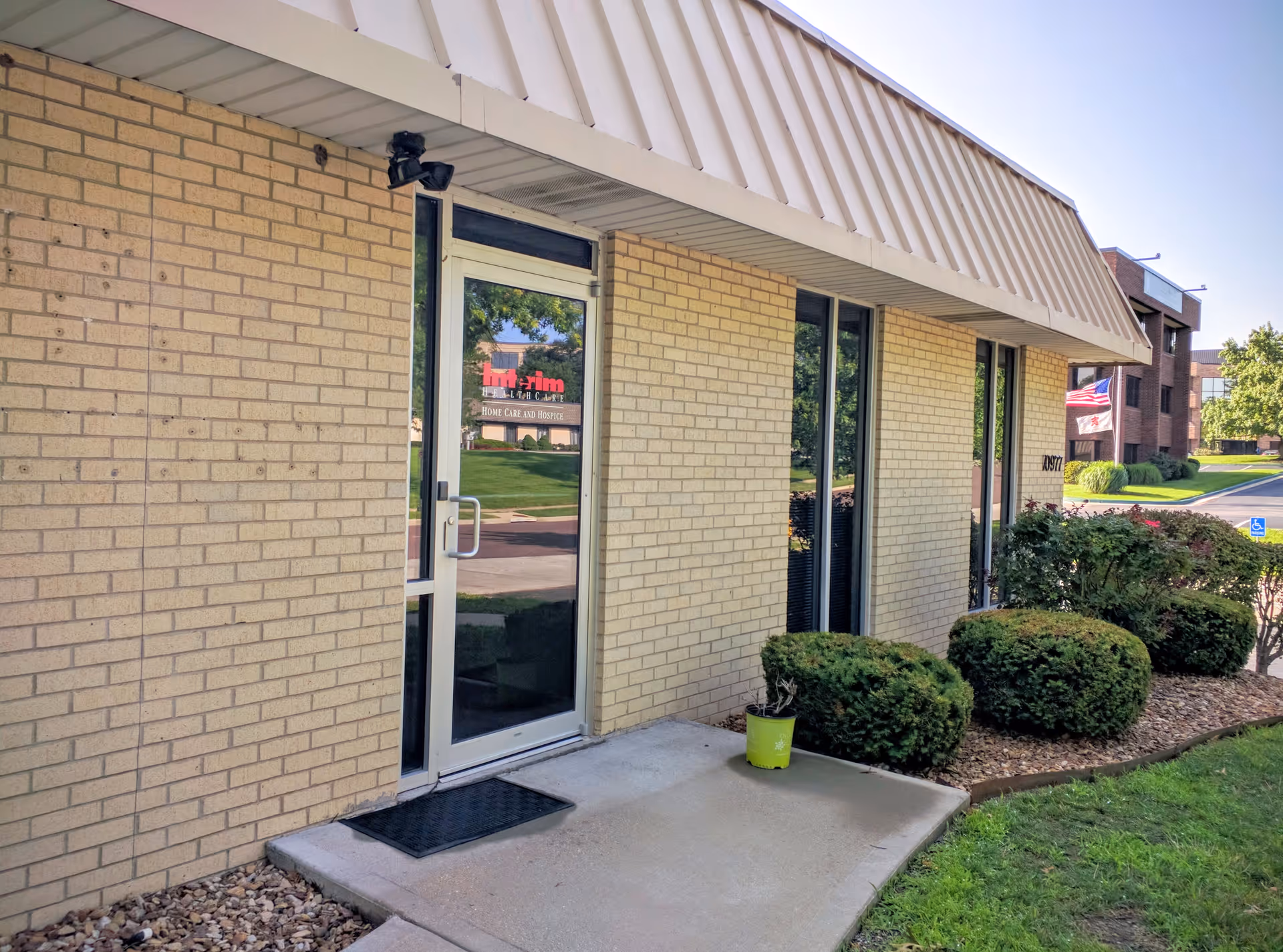 Exterior view of Interim HealthCare of Overland Park entrance with glass door.