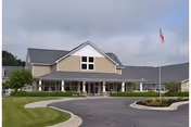 Exterior view of Medilodge of Montrose with front entrance and parking.