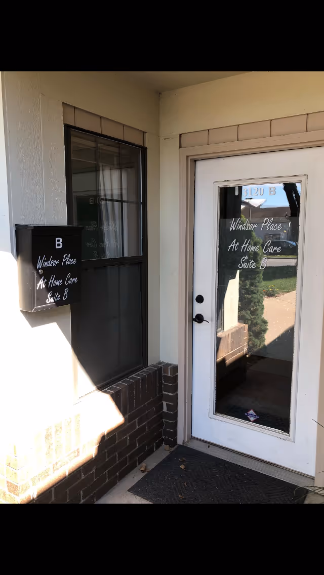Exterior entrance of Windsor Place At-Home Care with Suite B sign.