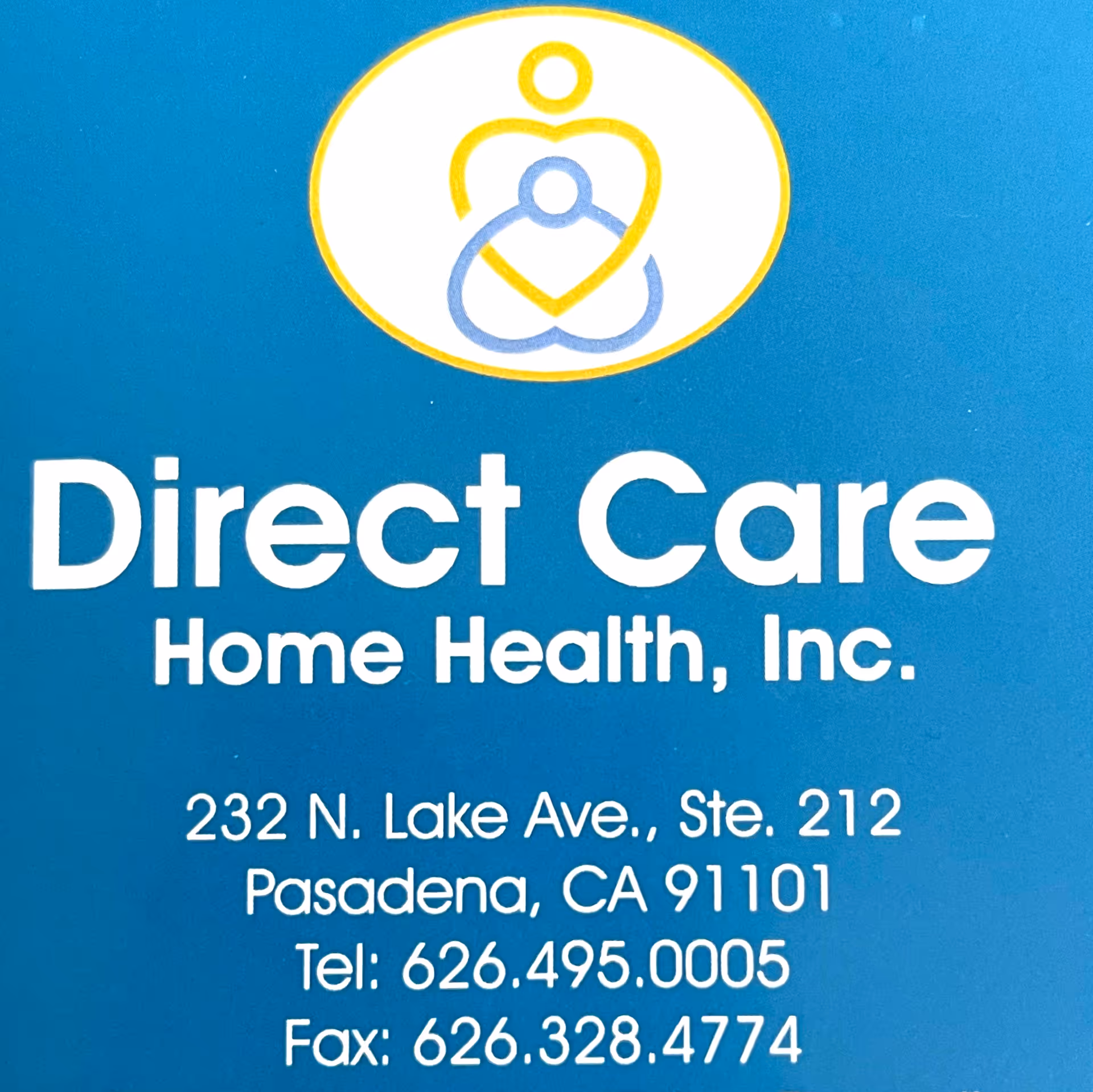 Blue exterior sign for Direct Care Home Health, Inc. with logo and address.
