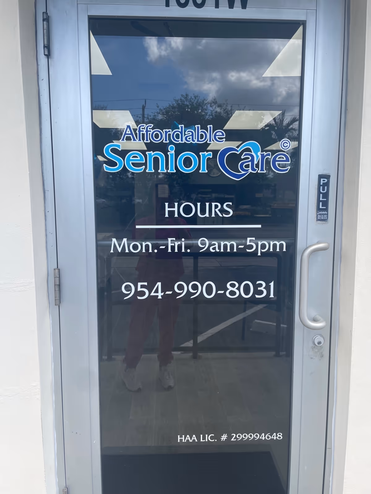 Glass entrance door displays Affordable Senior Care signage and hours.