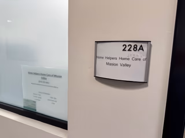 Interior hallway with unit plaque reading 228A for Home Helpers Mission Valley