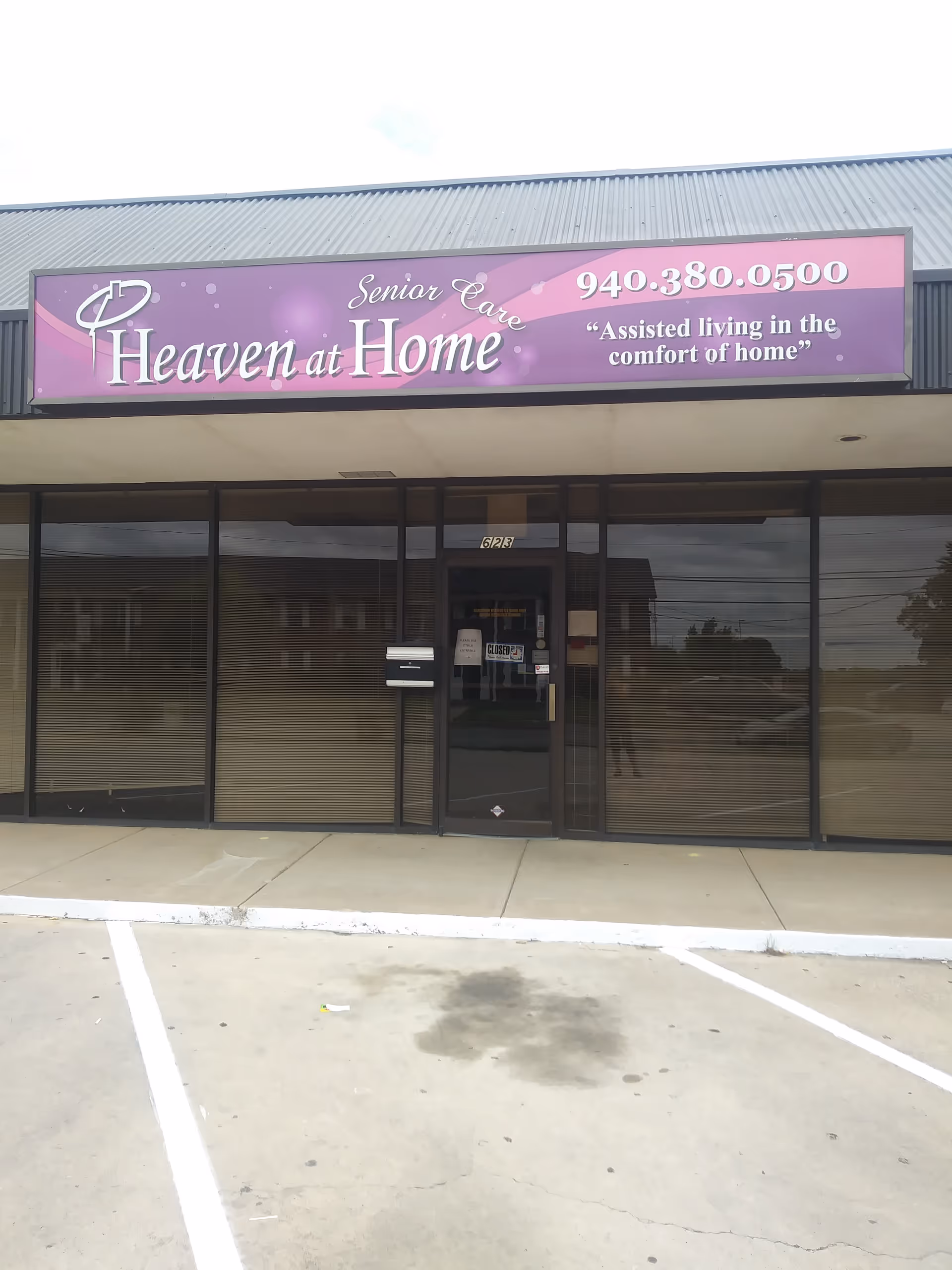 Front storefront of Heaven at Home Senior Care with a purple sign.