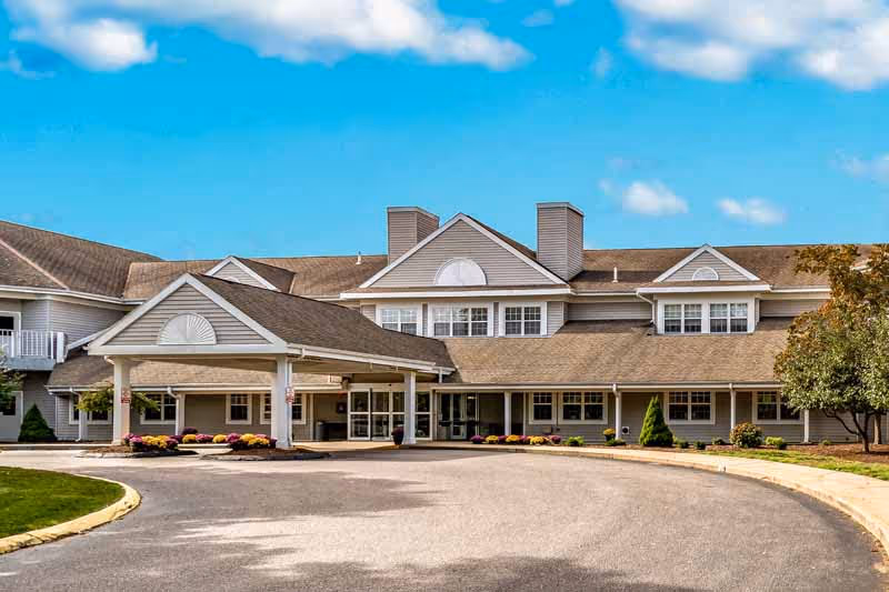 Exterior view of Pendleton Health and Rehabilitation Center building with entrance, driveway, and landscaping.