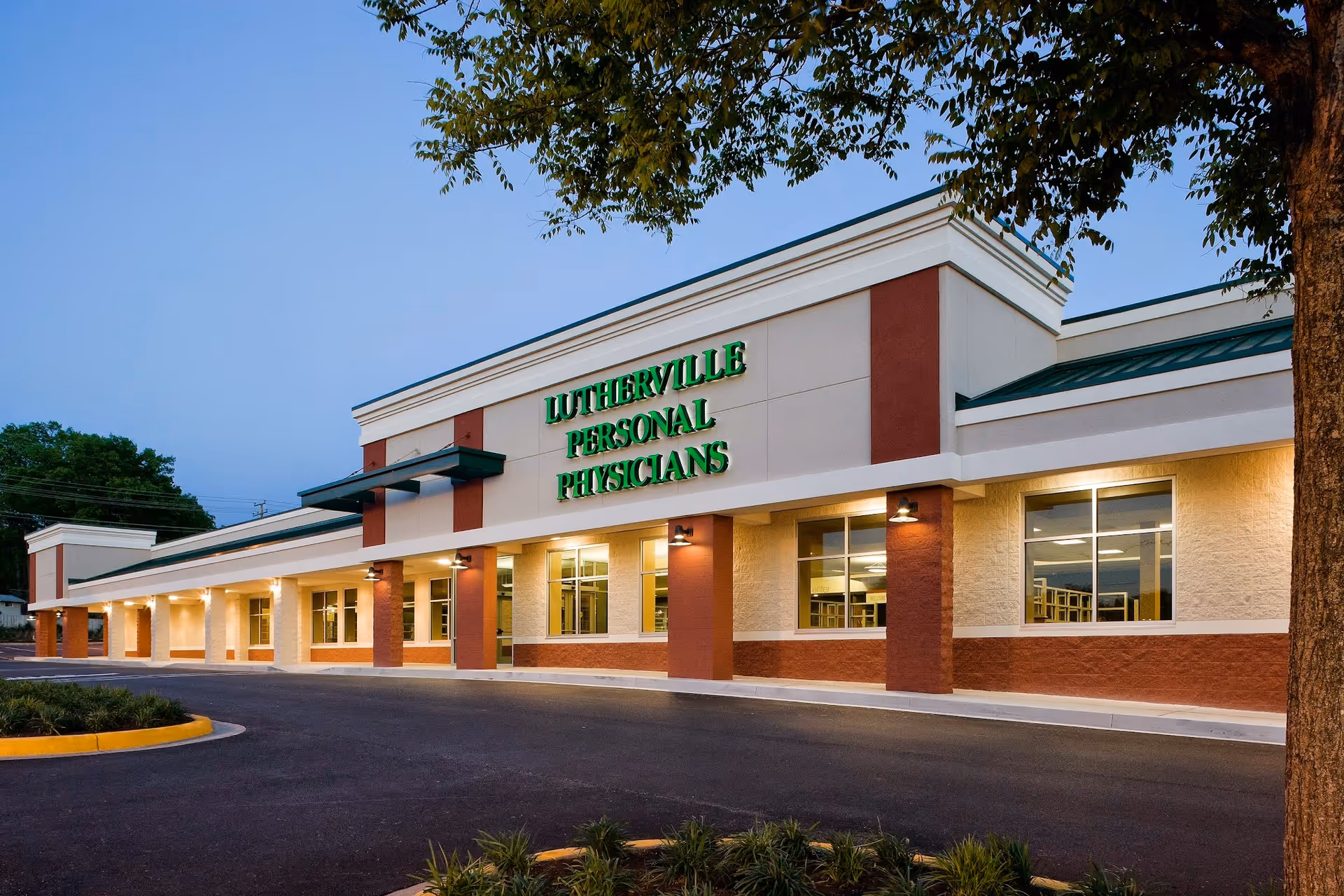 Exterior view of Mercy Personal Physicians at Lutherville building with green signage.