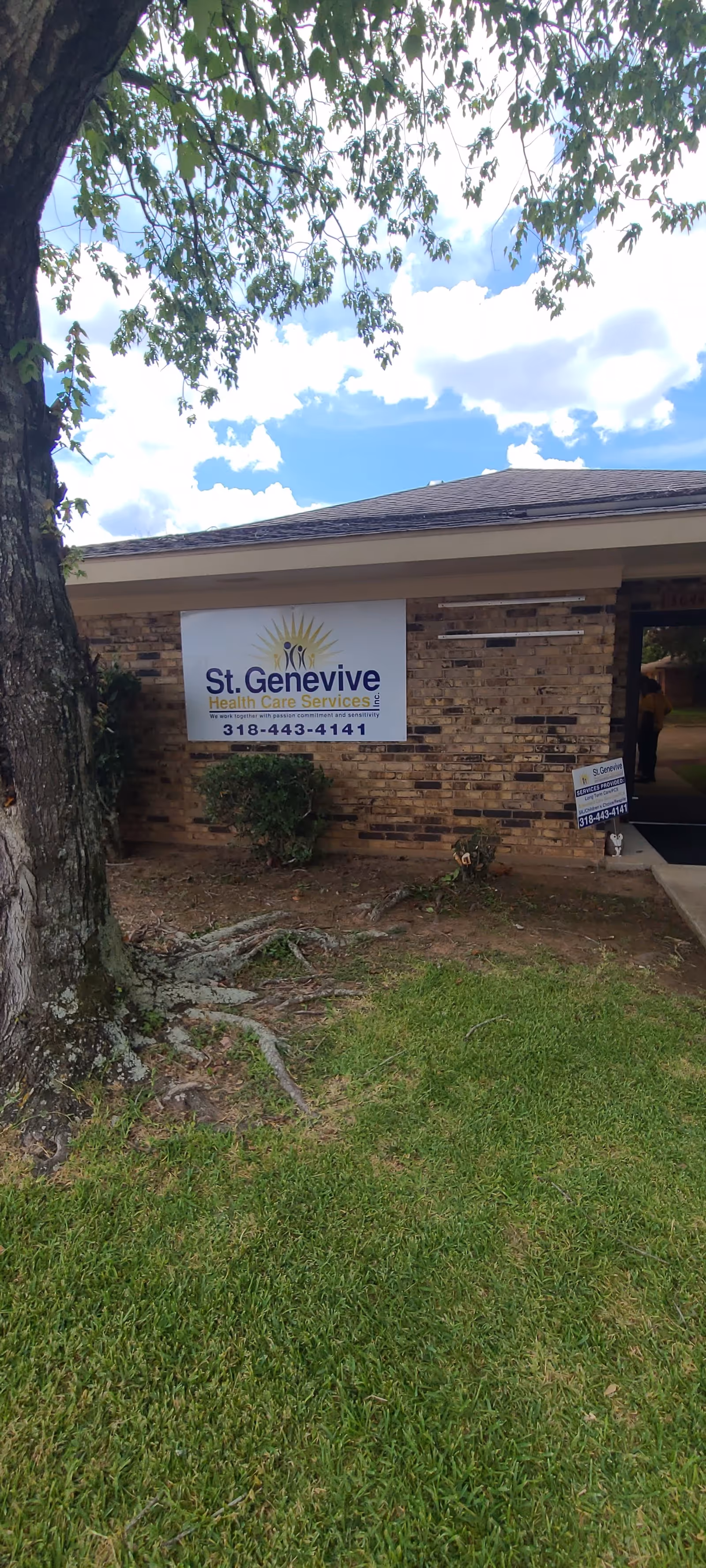 Brick building exterior with a sign for St Genevive Health Care Services Inc