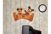 Indoor wall displays Ivy Hall sign with cartoon mice and a wall clock.