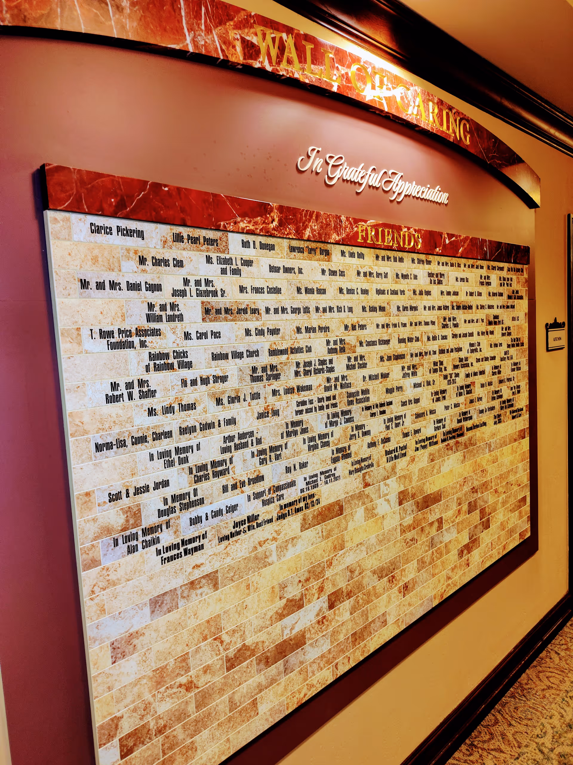 Interior hallway showing a large wall plaque titled In Grateful Appreciation with donor names