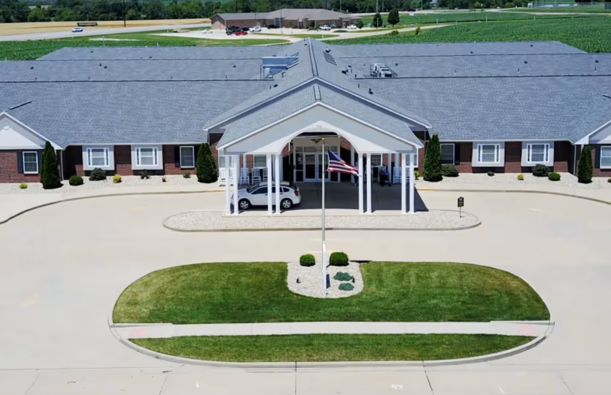 Aerial view of Garden Place Waterloo entrance with circular driveway and landscaped lawn.