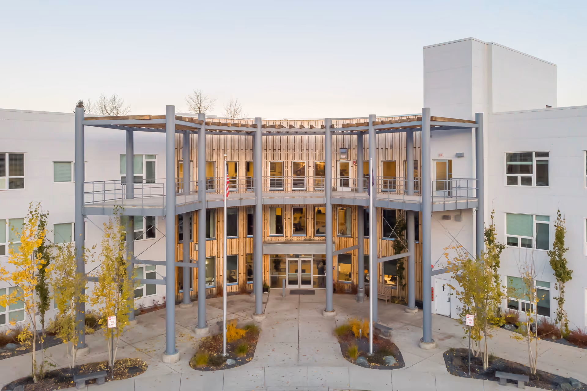 Baxter Senior Living campus exterior with a circular courtyard and tall columns.