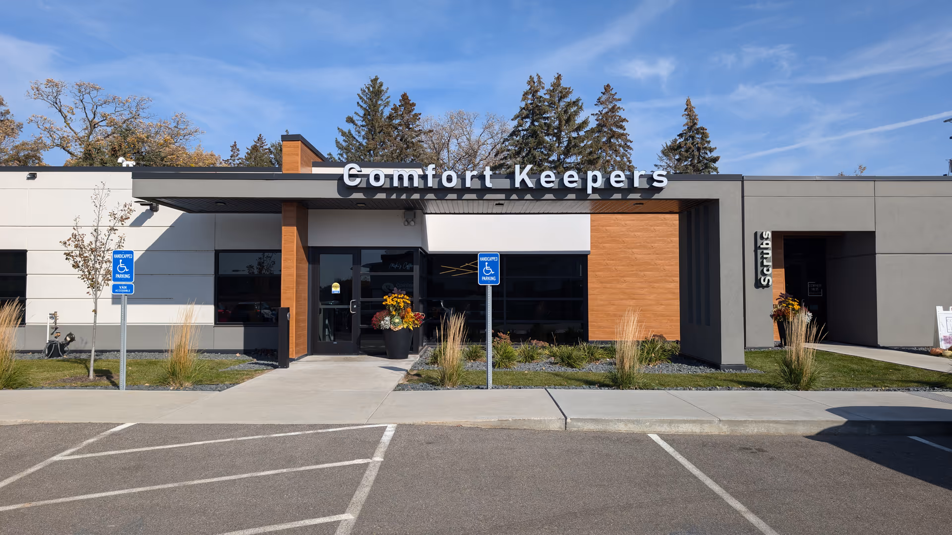 Exterior of Comfort Keepers in-home care facility with entrance, signage, and landscaping.
