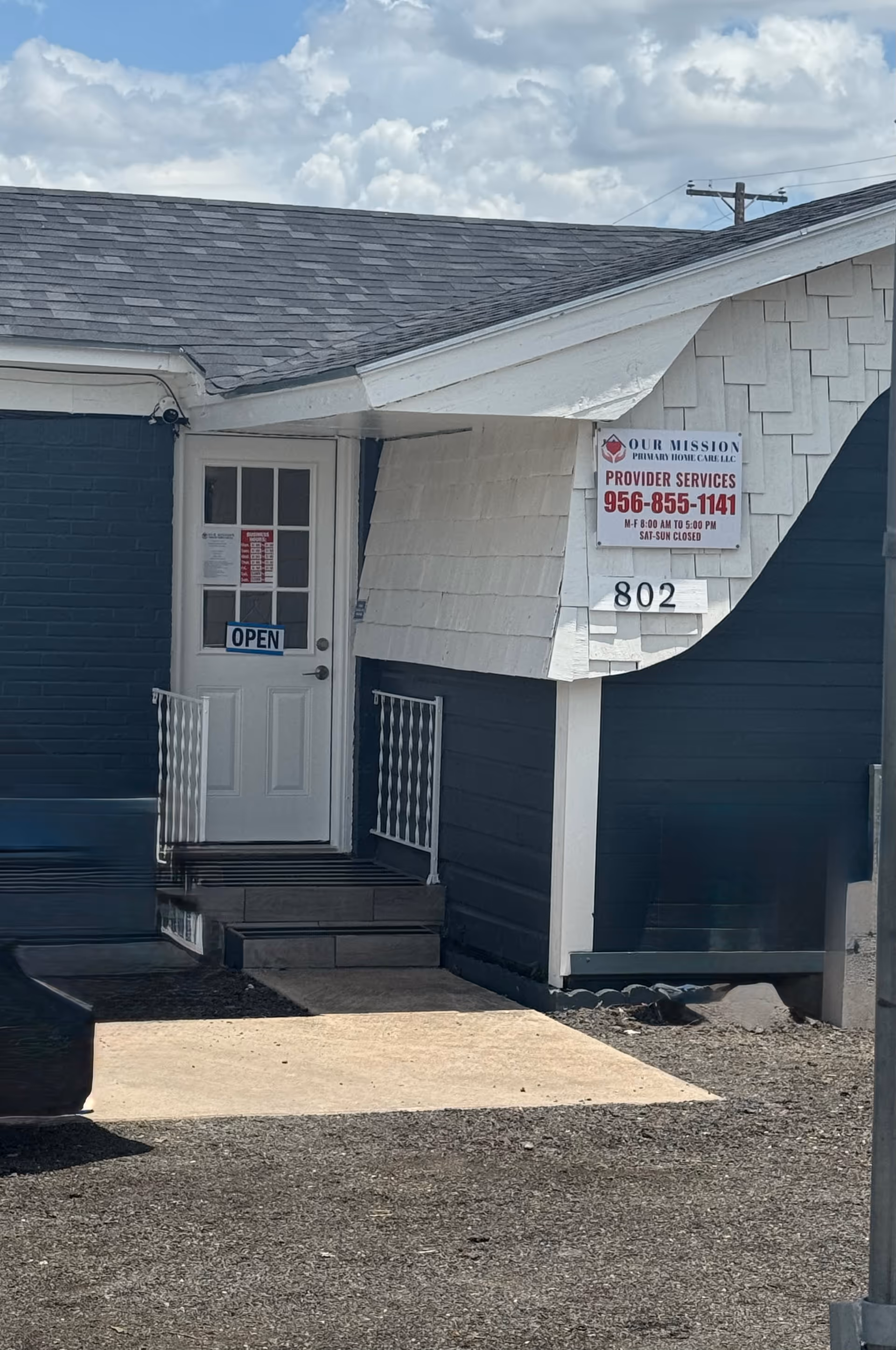 Our Mission Primary Home Care sign on exterior of a small facility entrance.