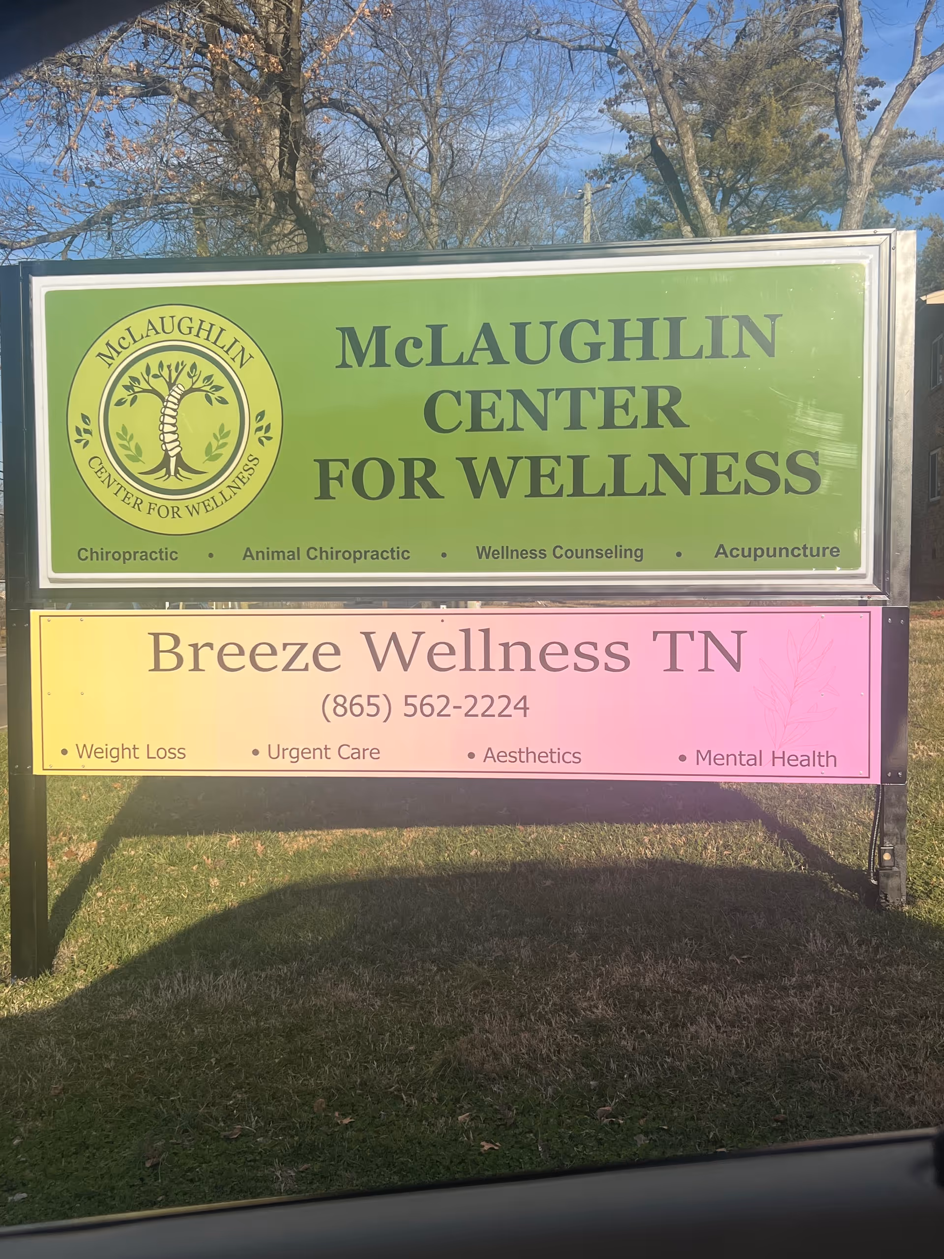 Outdoor signboard advertising Breeze Wellness TN and McLaughlin Center for Wellness.