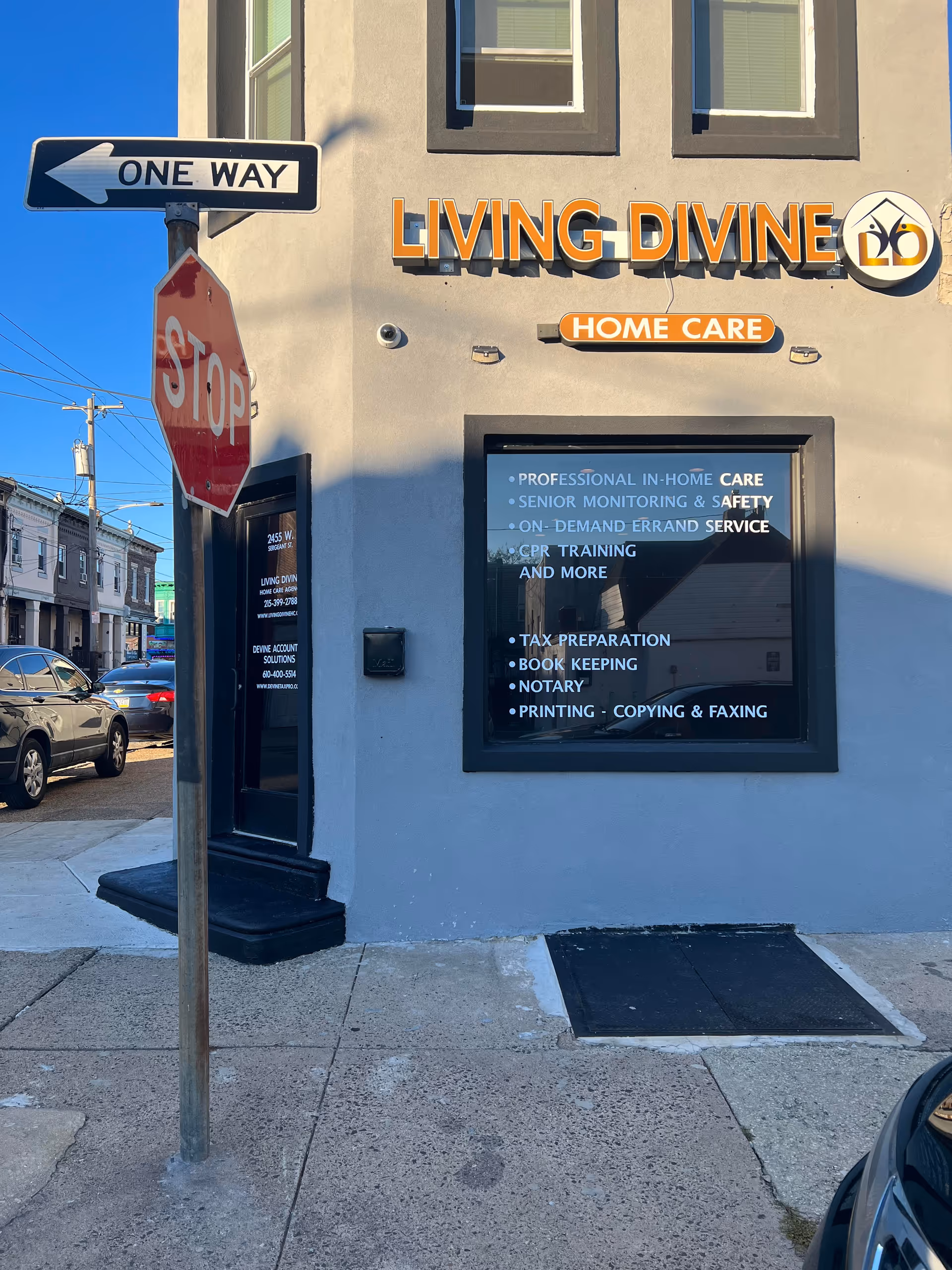 Exterior of Living Divine Home Care storefront with signage on street corner.