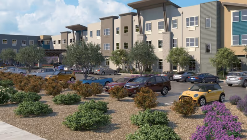 Exterior view of WellQuest of Elk Grove with a modern building, parking, and landscaping.