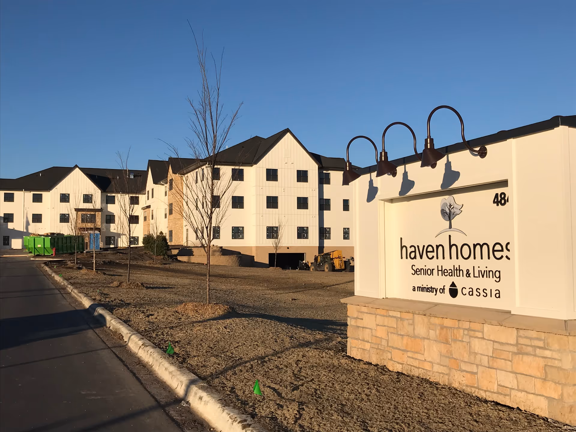 Exterior view of Haven Homes senior living facility with a large entrance sign.