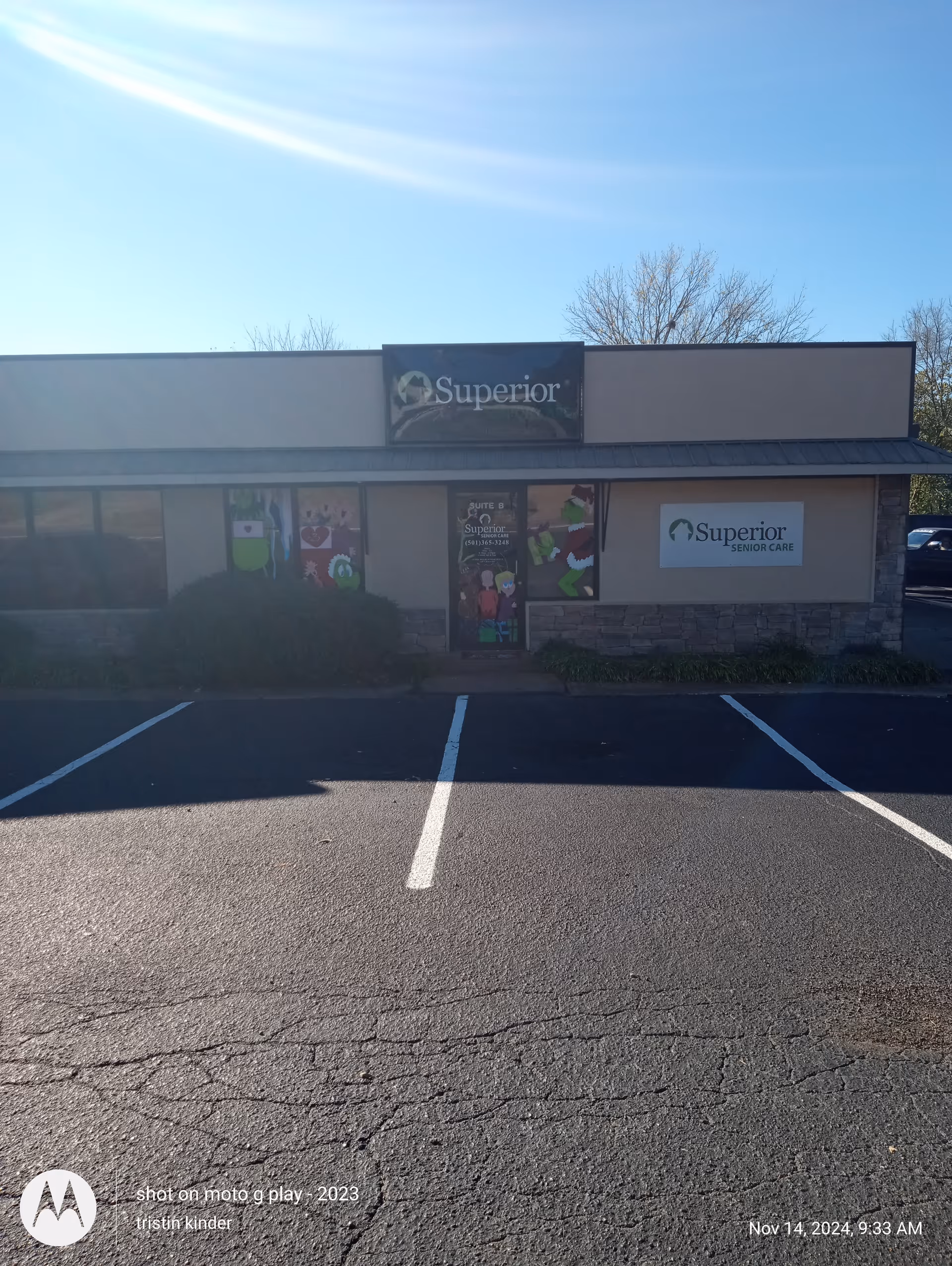 Exterior view of Superior Senior Care building with parking lot in foreground.