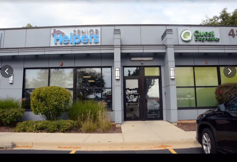 Exterior storefront of Senior Helpers Bolingbrook with glass doors and signage.