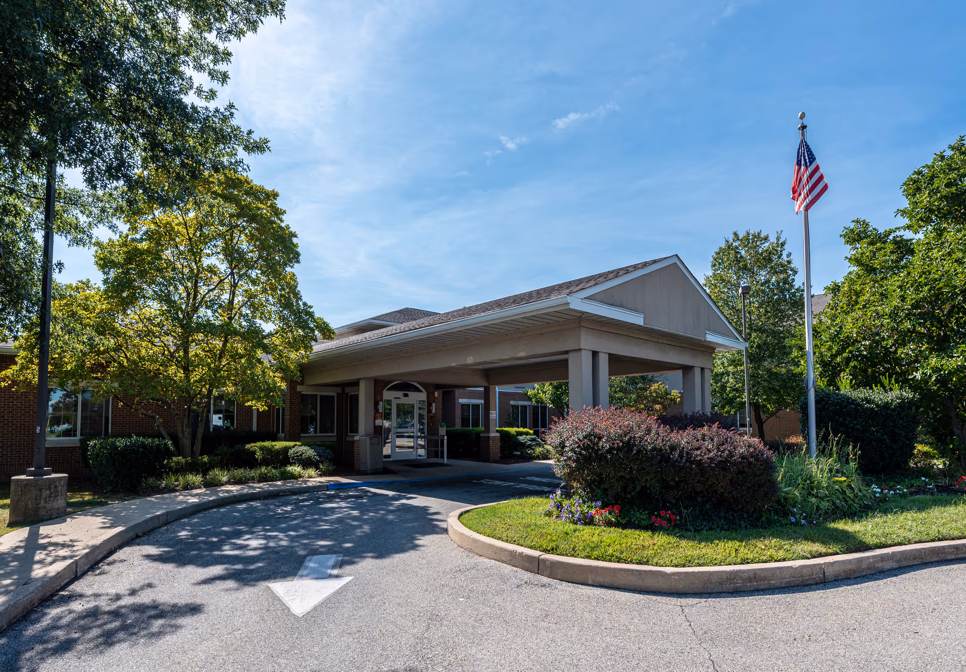Exterior view of Providence at Mercy Fitzgerald with the front entrance and landscaping.