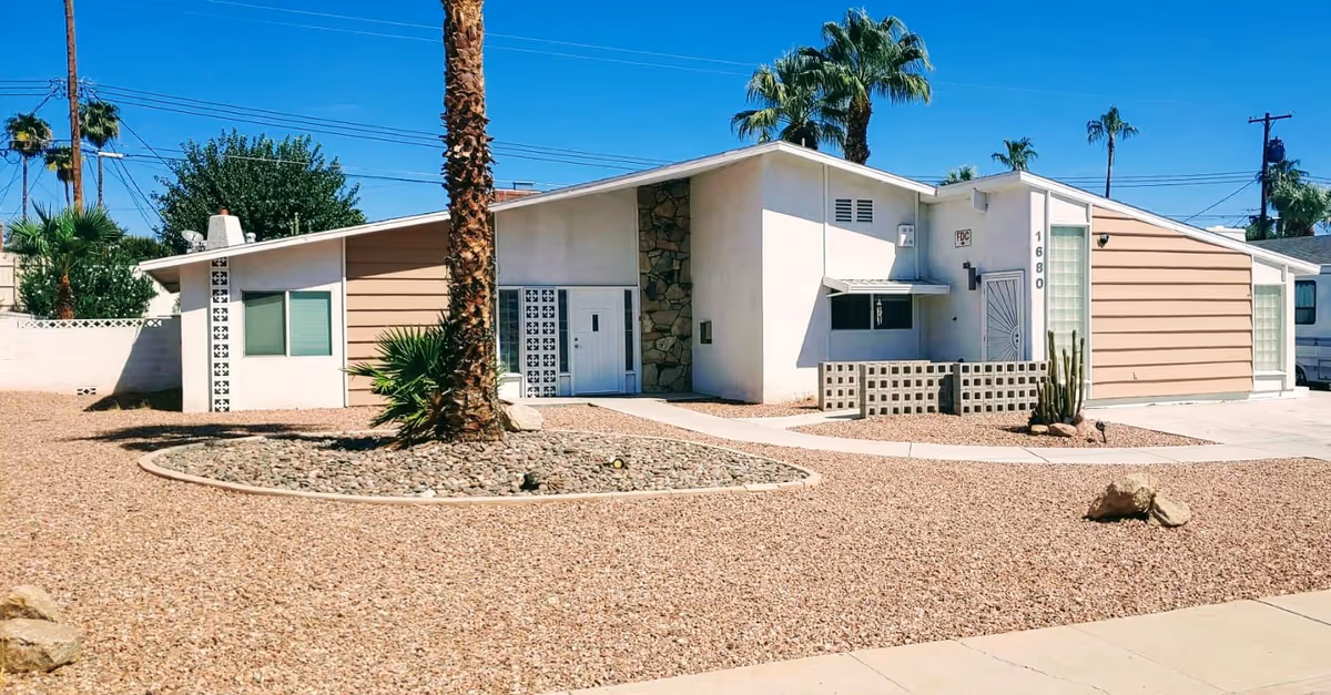 Front exterior of Las Vegas Group Home, a single-story facility with desert landscaping.