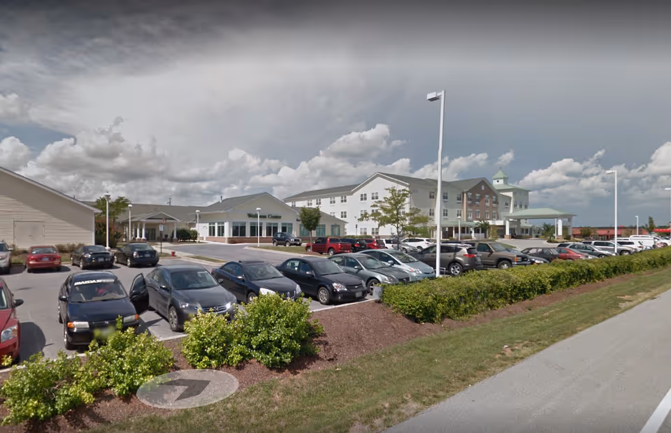 Front view of Lorien Taneytown facility with parking lot and landscaped entrance.
