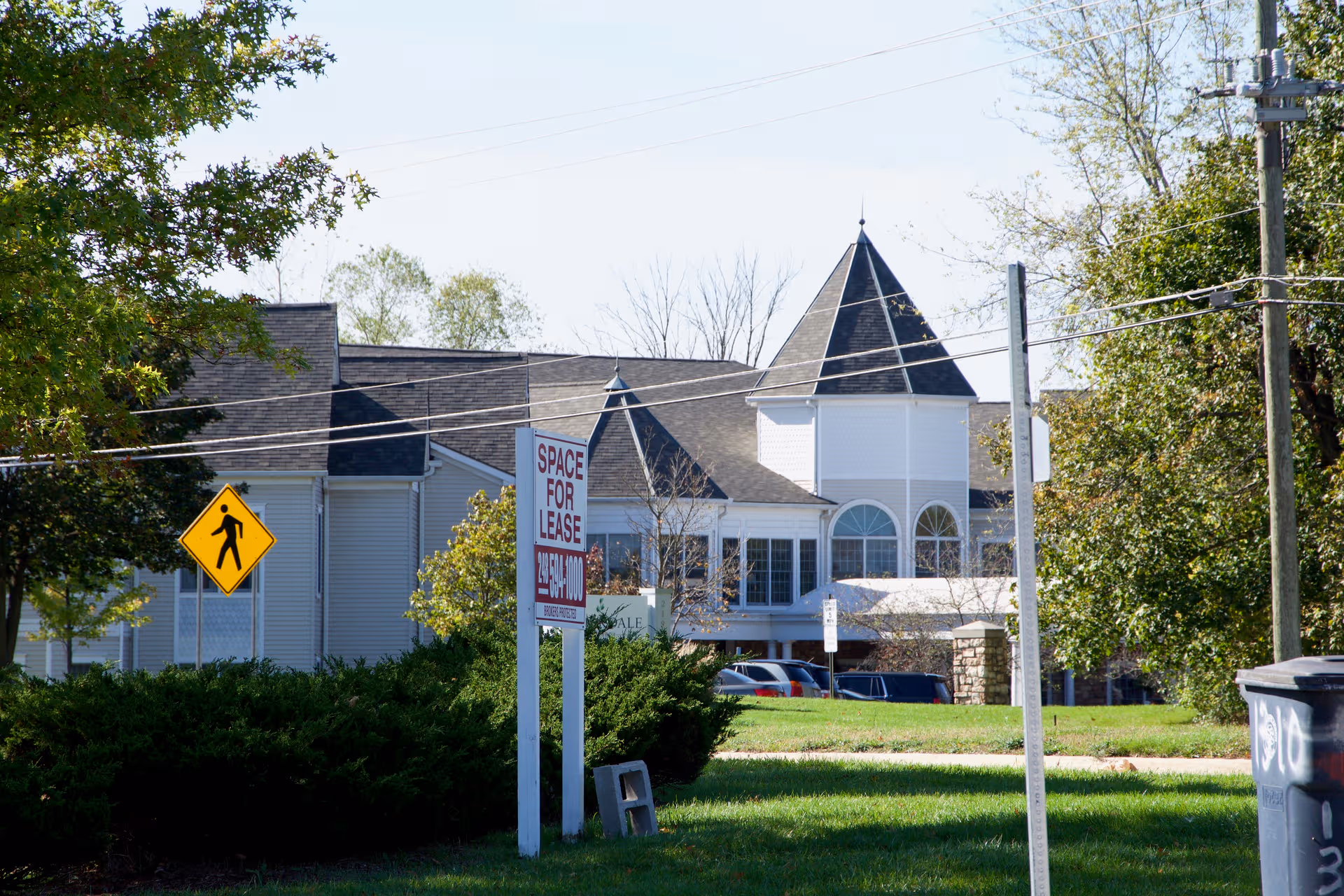 Exterior view of Brookdale Ann Arbor, a senior living building, with a Space for Lease sign.