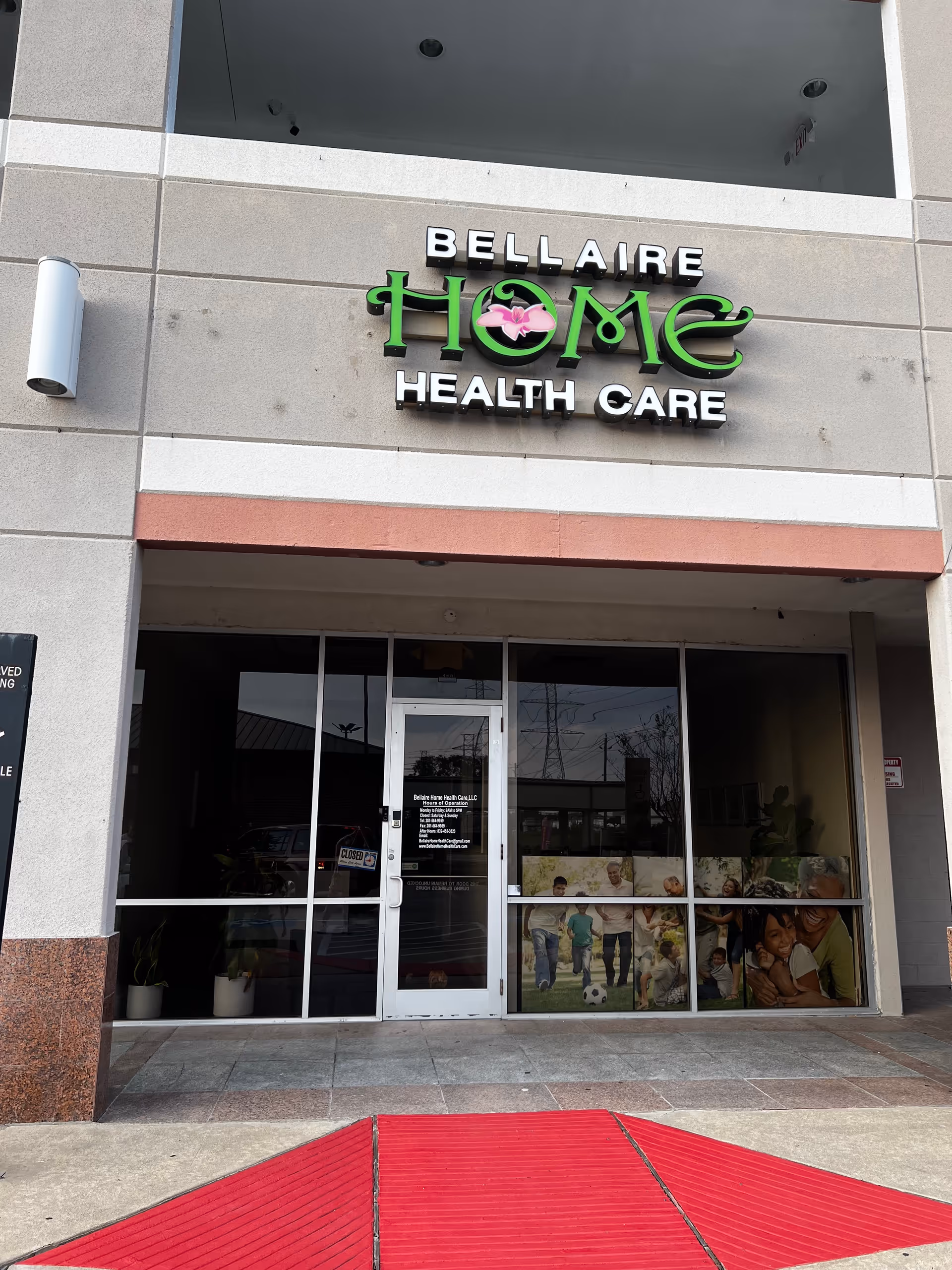 Front of Bellaire Home Health Care building entrance with glass doors and sign.