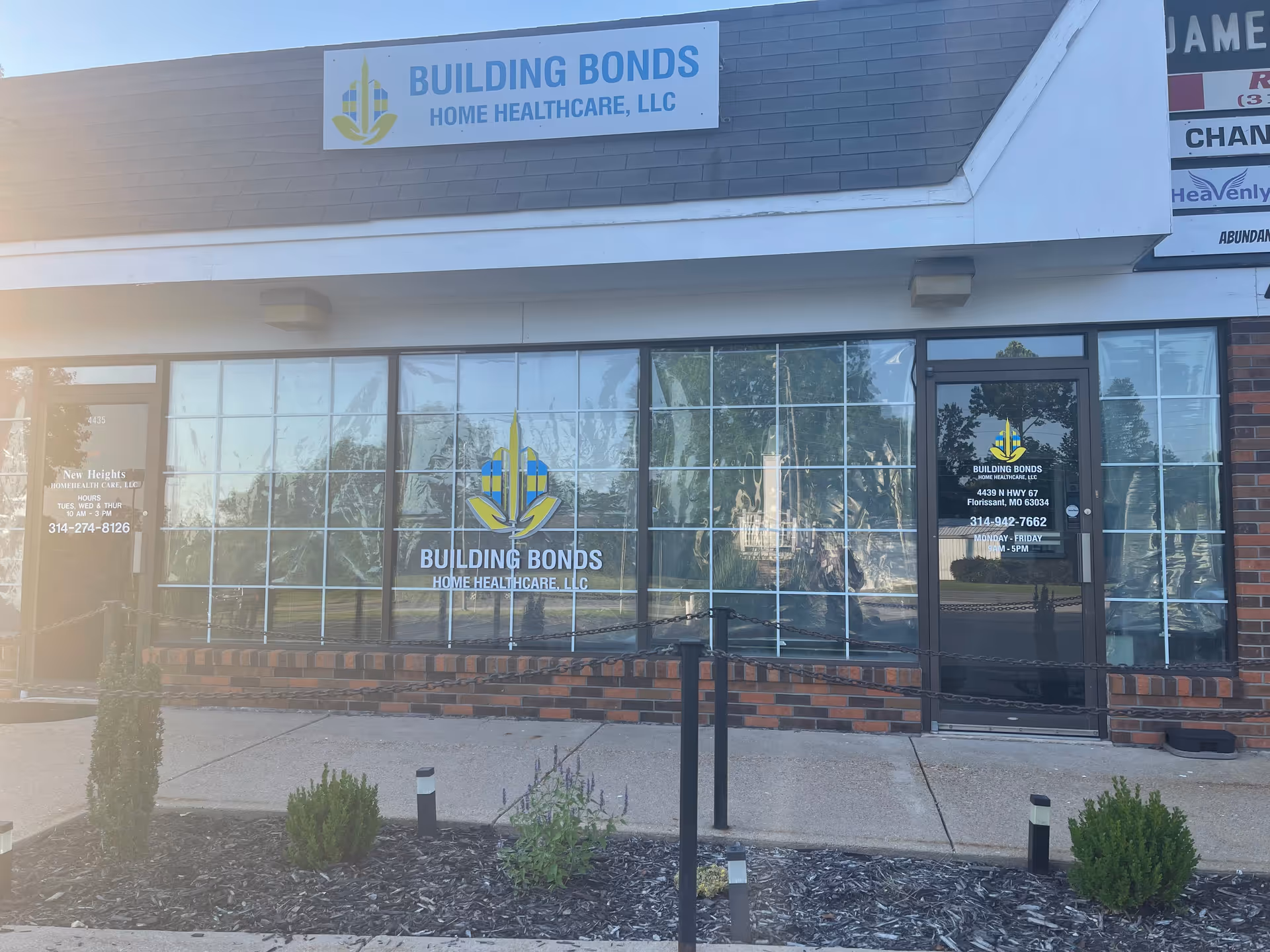 Exterior storefront of Building Bonds Home Health Care LLC with large windows and sign.