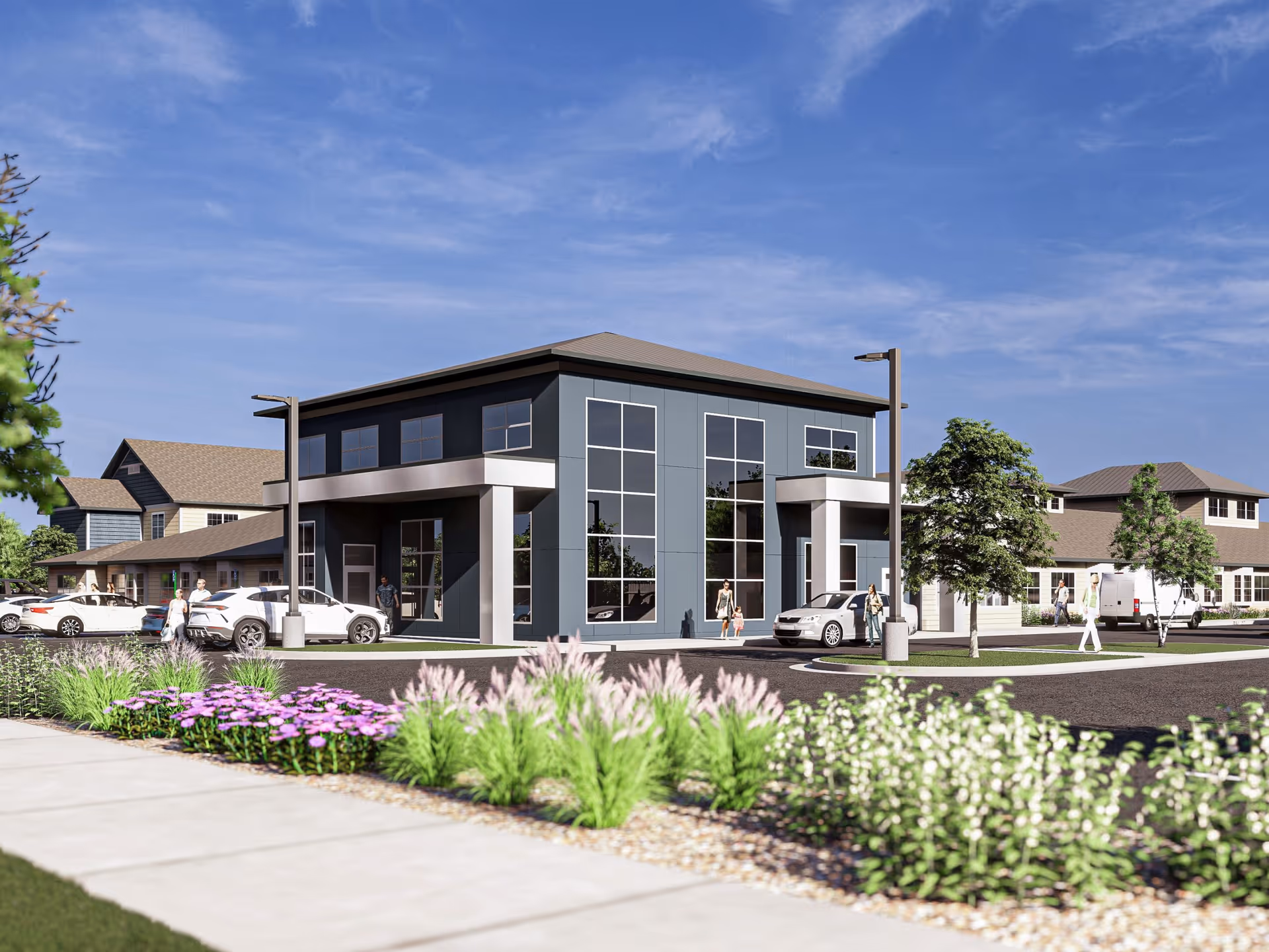 Beacon Pointe memory care building exterior with glass façade, front entrance, cars, and landscaping.