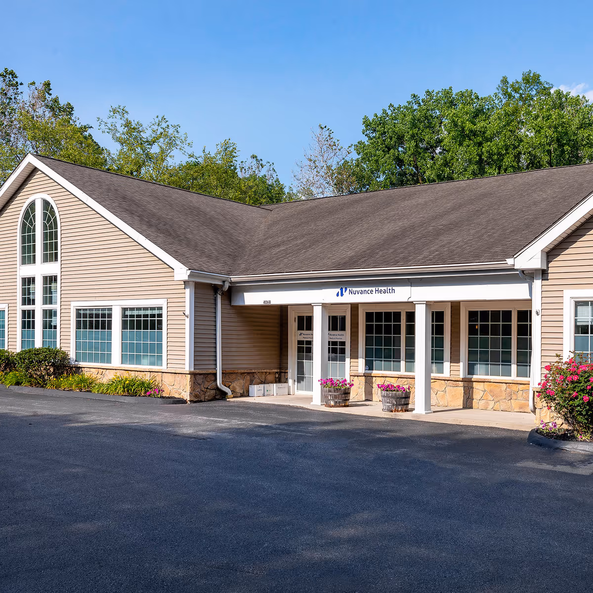 Exterior view of a Nuvance Health Primary Care Hyde Park facility with entrance.
