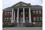 Brick building with tall columns and a broad front staircase, Lincoln House.