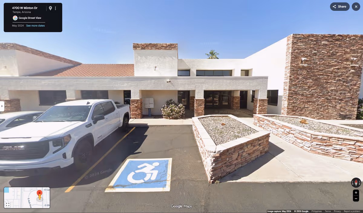 Front view of Family Care Palliative & Hospice facility with wheelchair parking.