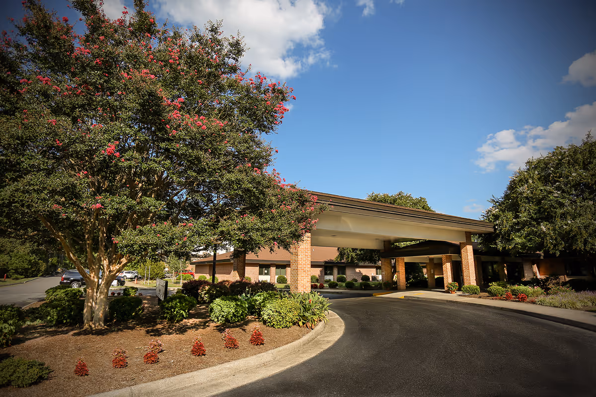 Exterior view of York Nursing and Rehabilitation facility with entrance canopy and landscaping.