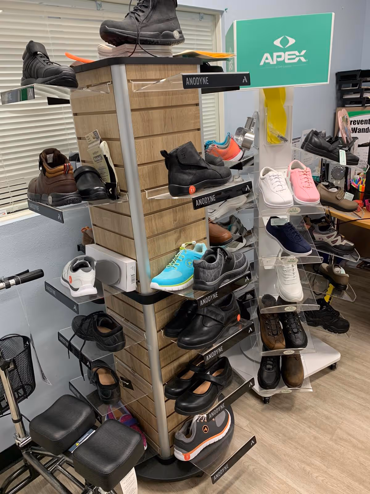 Interior display of shoes on shelves inside Horizon Medical Supply store.