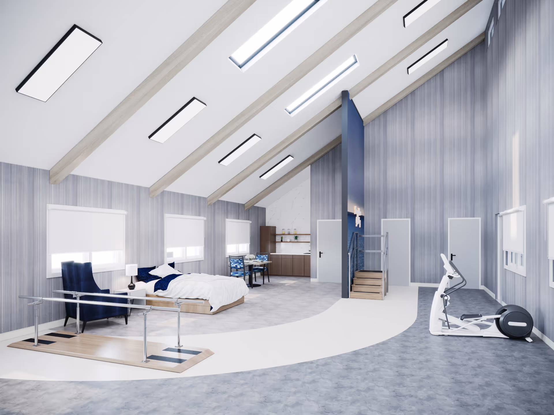 Spacious rehabilitation room with a bed, exercise area, and seating under skylighted ceiling.