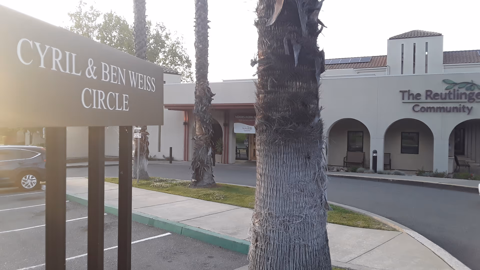 Exterior view of The Reutlinger Community entrance with Cyril & Ben Weiss Circle sign