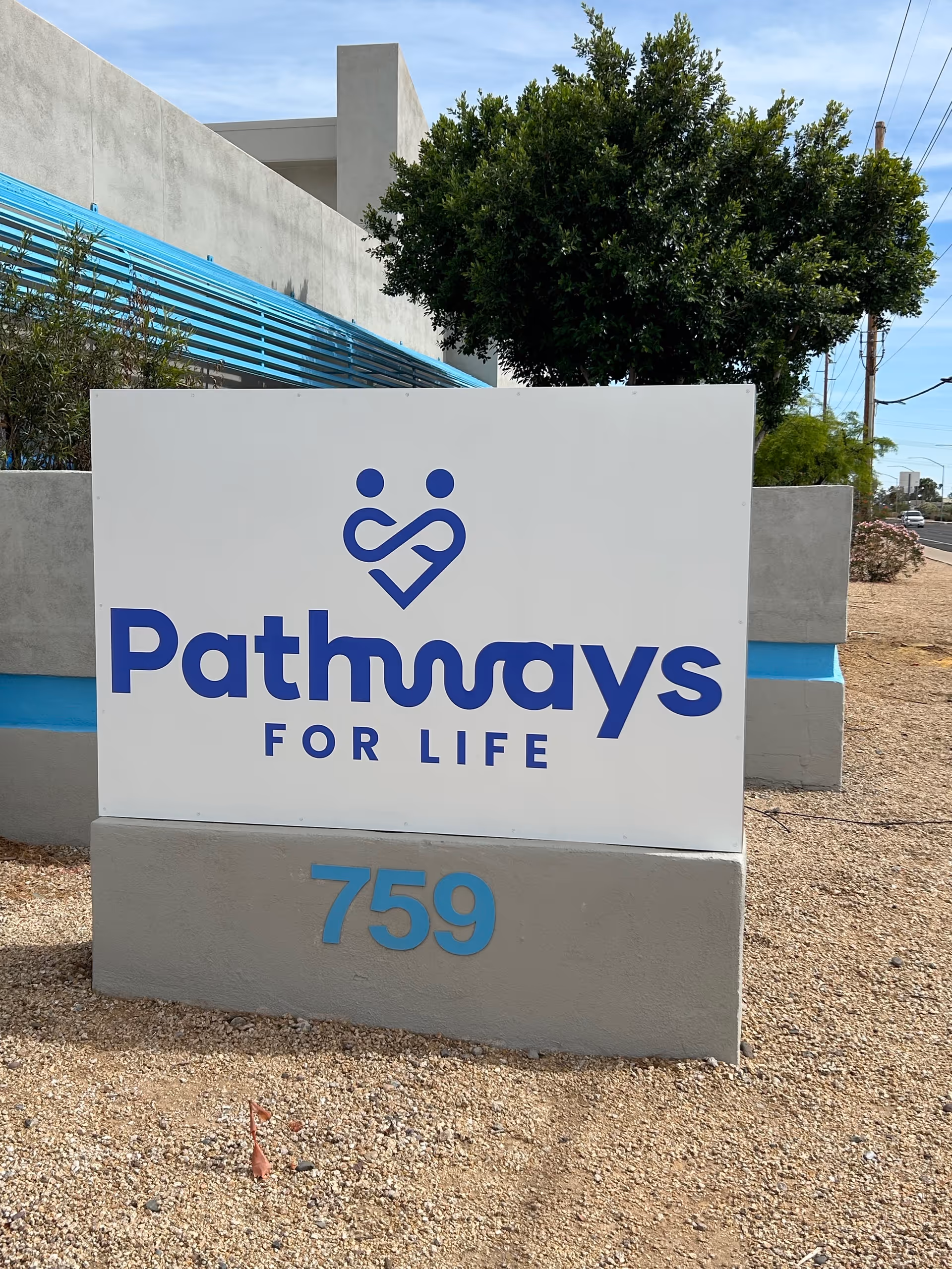 Outdoor Pathways For Life sign outside the Mesa facility, showing 759.