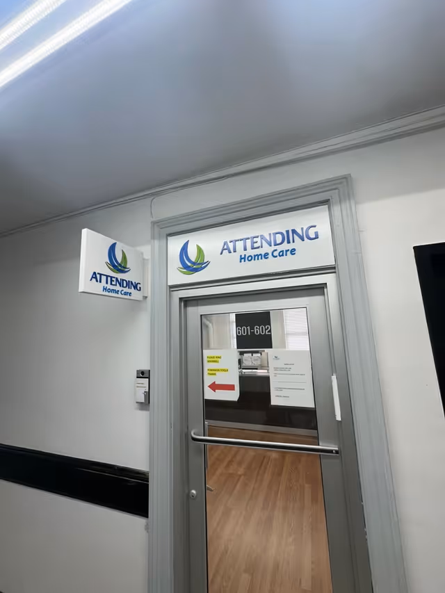 Indoor hallway at Attending Home Care Bronx with door marked 601-602